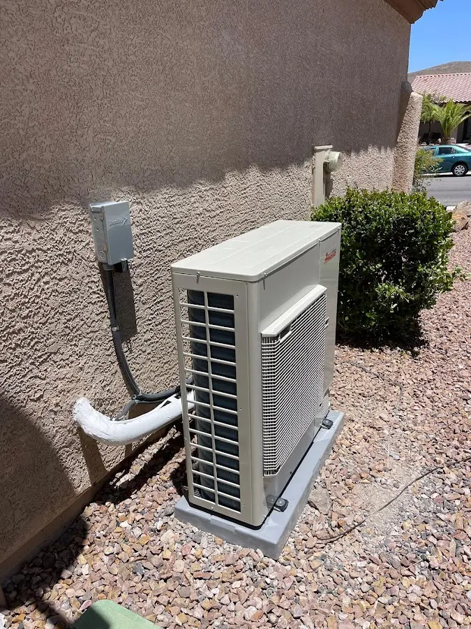 Residential air conditioning condenser unit in Prosser
